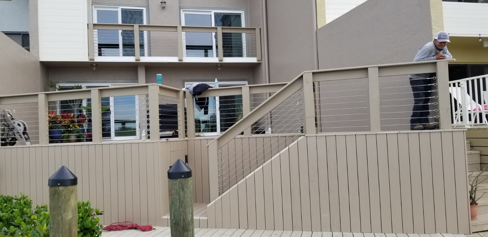 Composite deck with SST cable rail